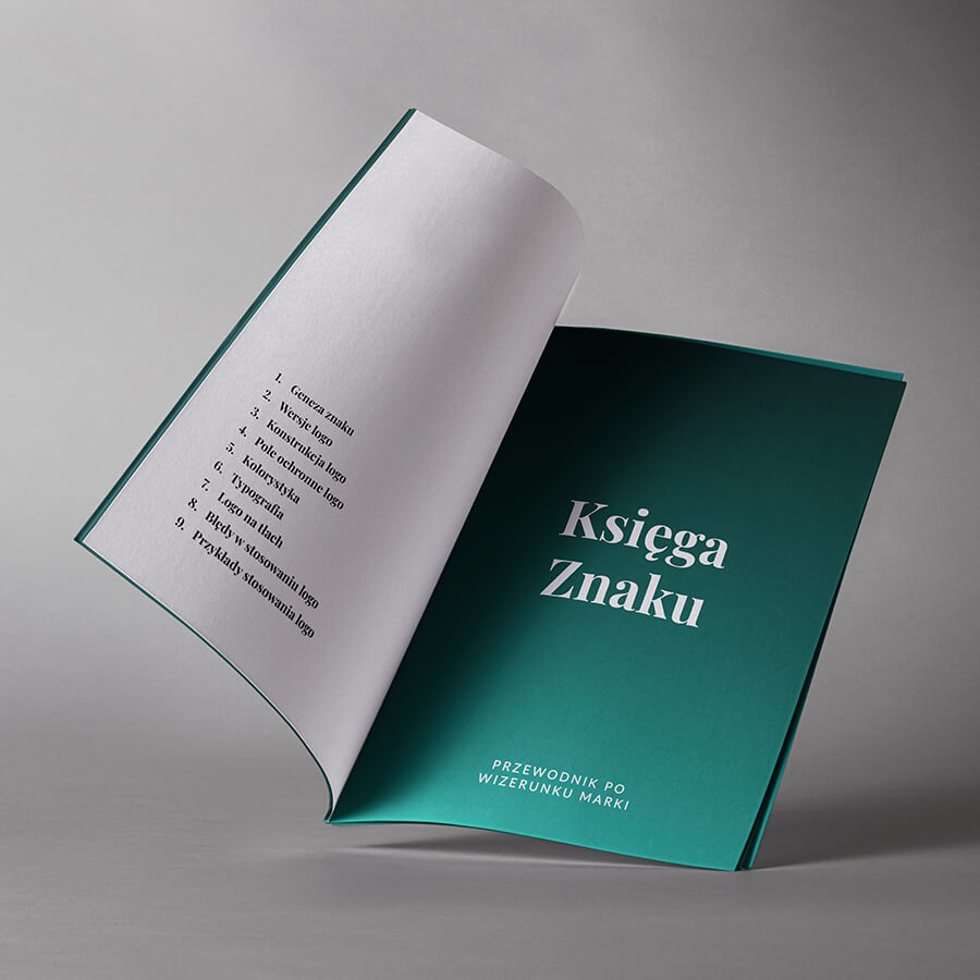 otwarta książka z widoczym tytułem Księga Znaku - przewodnik po wizerunku twojej marki